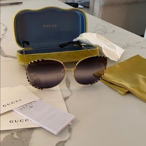 GUCCI oversized sunglasses.